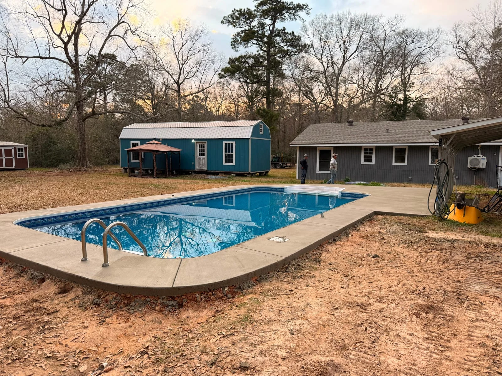 A finished concrete walkway poured by Santoyo's Concrete in East Texas